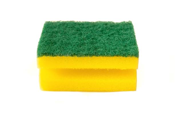 istock Yellow dish sponge isolated on white background 1443586720