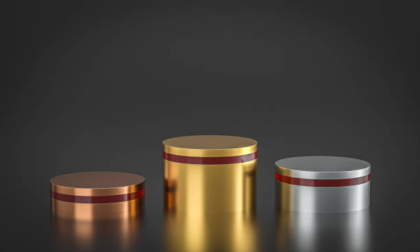 istock metal podiums with red line on dark background. 1443591394