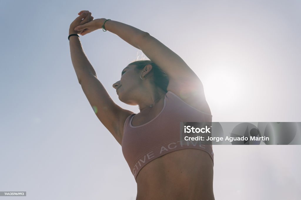 Both Hand Rise Stretch Athlete Woman Performing Shoulder And Back Stretches While Raising Both ...