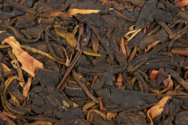 istock Aromatic black dry tea, isolated on white. 1443598503