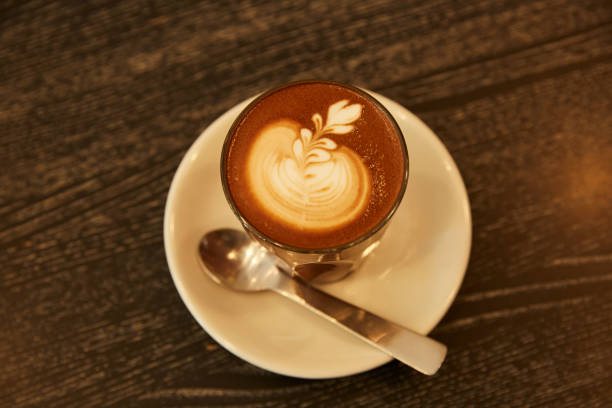istock Coffee with spoon on a wooden desk. 1443598851