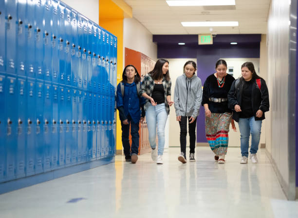 istock Five best friends walking on the corridor 1443600433