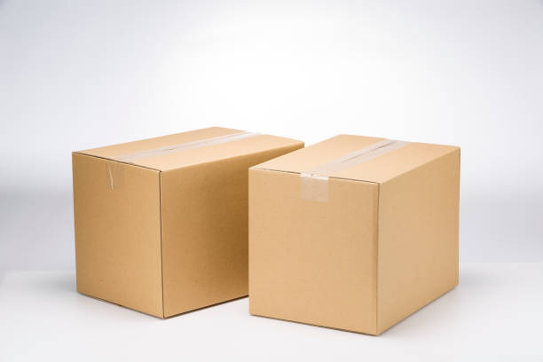 istock Closed up shot paper box taped and isolated on a white background. 1443600571