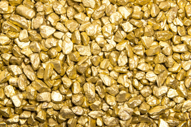 istock smal golden nuggets background 1443603528