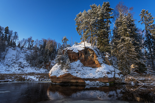 River Amata near the Zvartas rock in winter