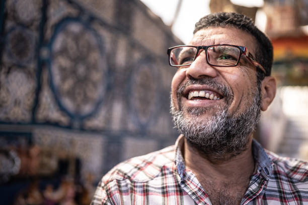 Mature man looking away contemplating