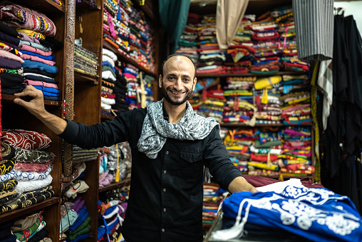 Portrait of a business owner in his store