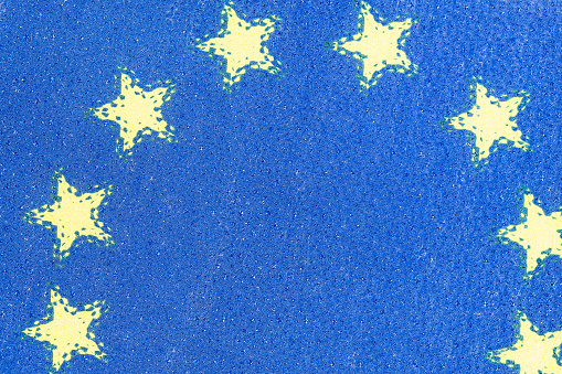 European Union flag abstract background texture. Textured glass photographic effect