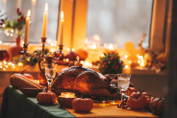 istock Thanksgiving holiday dinner table setting with fall decoration and pumpkins 1443624913