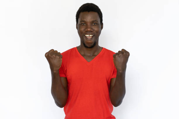 istock Confident man with clenched fists 1443625151
