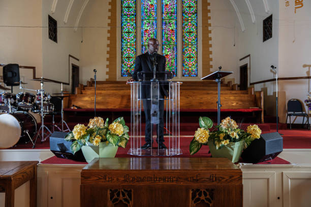 istock Black Congregation attend Black Baptist Church service 1443625174