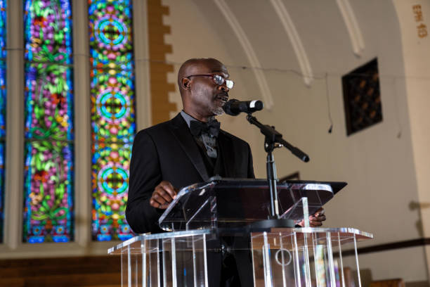 istock Black Congregation attend Black Baptist Church service 1443625215