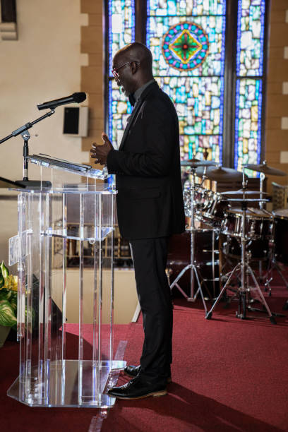 istock Black Congregation attend Black Baptist Church service 1443625227