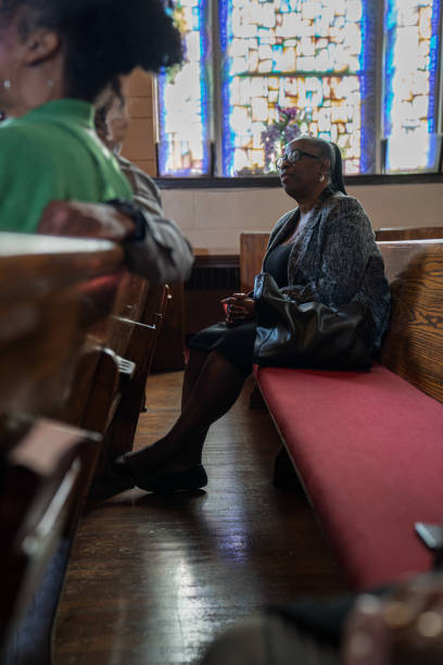 istock Black Congregation attend Black Baptist Church service 1443625292