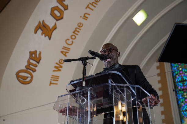 istock Black Congregation attend Black Baptist Church service 1443625300