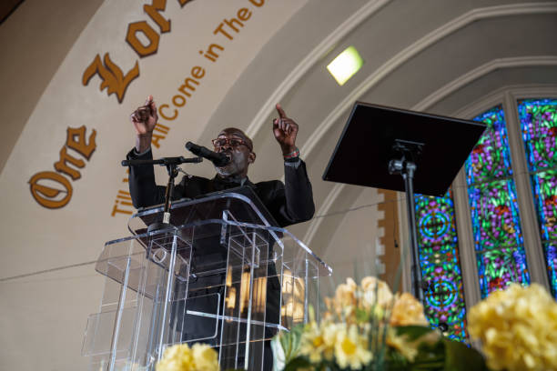 istock Black Congregation attend Black Baptist Church service 1443625358