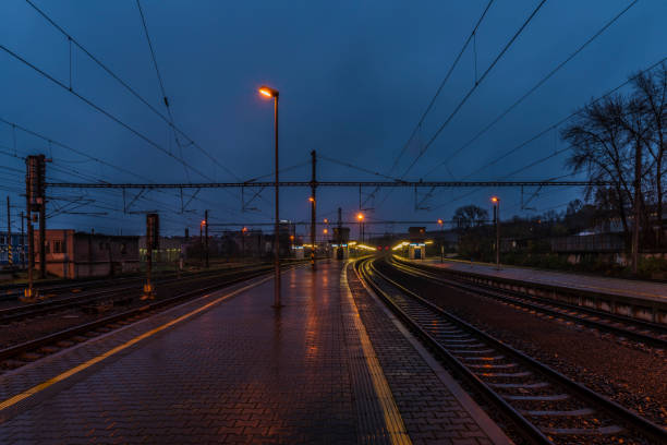 View on Prague Liben railway station in rainy evening stock photo