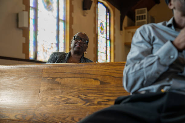 istock Black Congregation attend Black Baptist Church service 1443625428