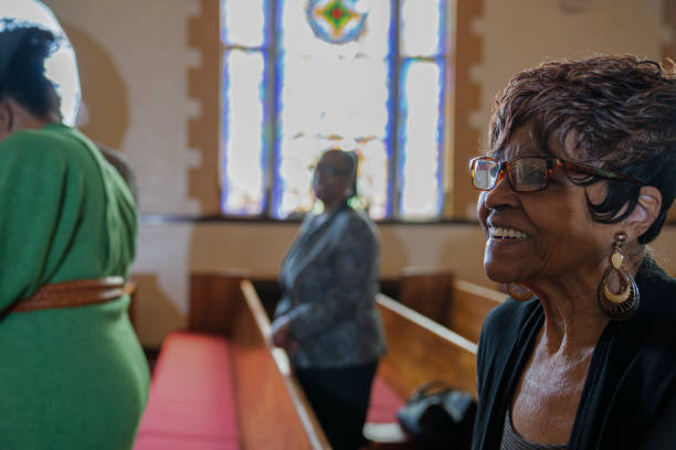 istock Black Congregation attend Black Baptist Church service 1443625451