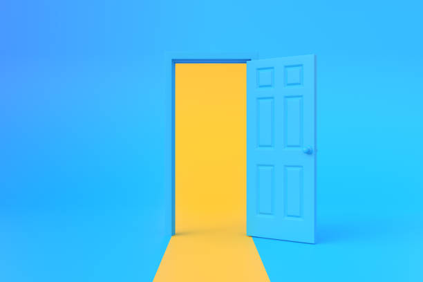 istock Yellow light going through the opening door in blue background room 1443625497
