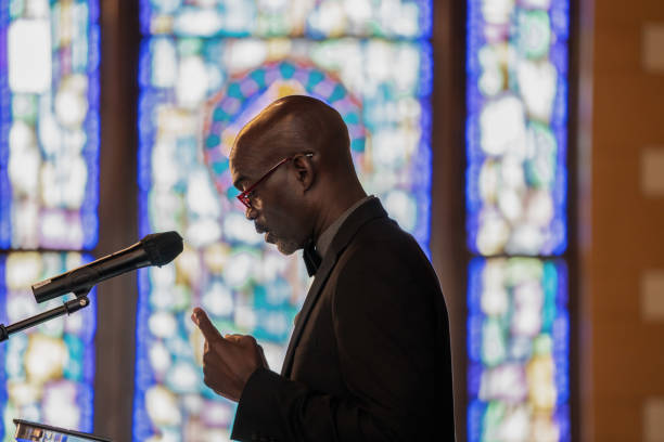 istock Black Congregation attend Black Baptist Church service 1443625598