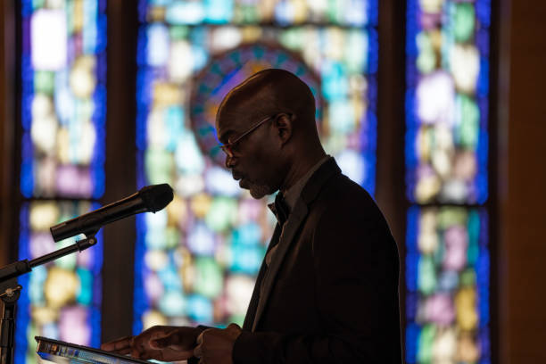 istock Black Congregation attend Black Baptist Church service 1443625623