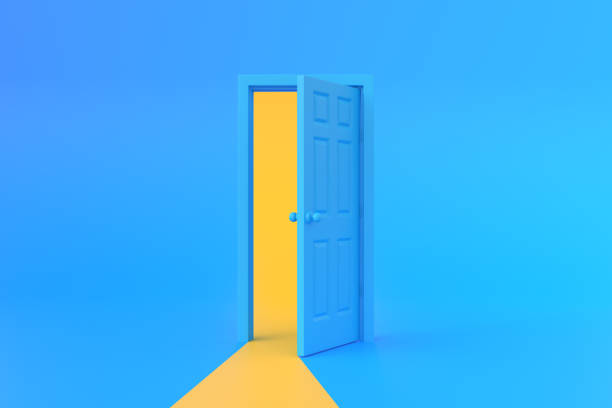 istock Yellow light going through the opening door in blue background room 1443626824