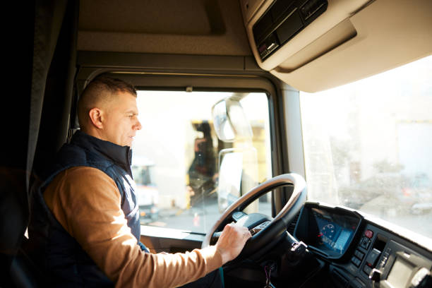 istock Truck driver in the driver's seat 1443627425