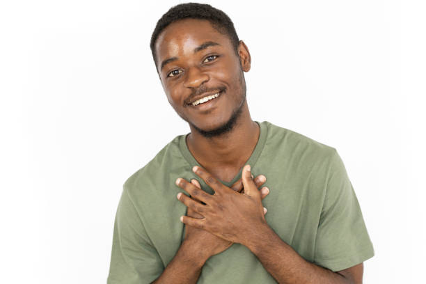 istock Pleased young man smiling from hearing compliment 1443627586