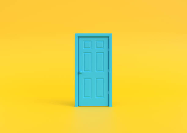 istock Closed blue door in yellow background room 1443627712