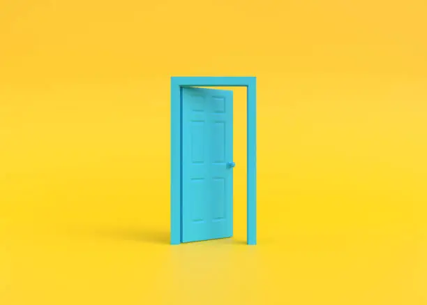 Photo of Open blue door in a room with a yellow background