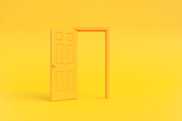 istock Open yellow door in a room with a yellow background 1443629757