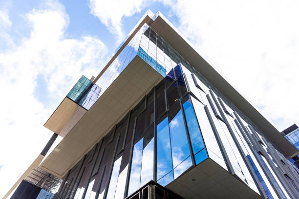istock Low angle view of modern office building, skyscrapers, sky background with copy space 1443632544