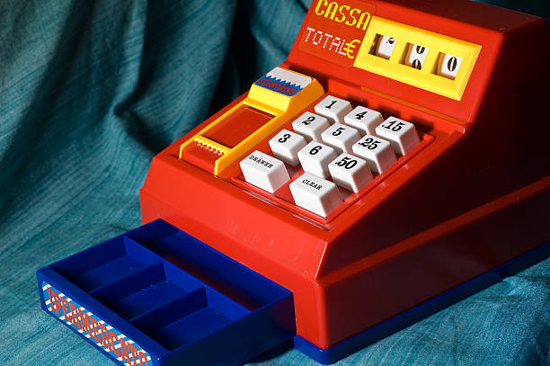 A red and blue empty cash register toy