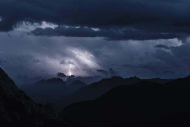 istock Huge lightning strike over Marmolada observed from Falzarego pass camper parking area. Falzarego pass, Dolomites, South Tirol, Italy, Europe. 1443632673