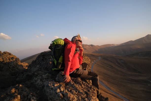 istock Traveling alone in the mountains at sunset 1443633258
