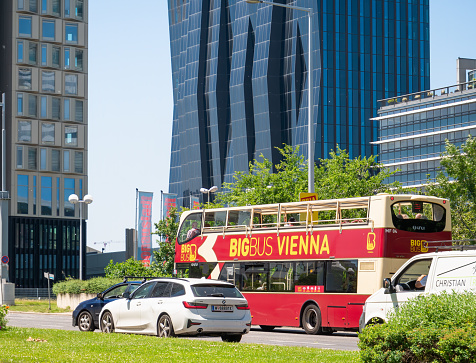 Vienna, Austria - June 2022: Big Buss Vienna Hop-On Hop-Off Tours in traffic