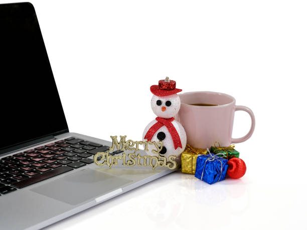 istock laptop, coffee and Christmas decorations 1443638548