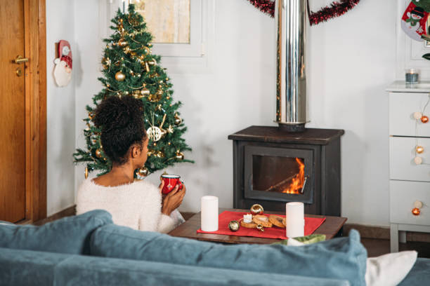 istock Woman with hot drink on Christmas 1443640527