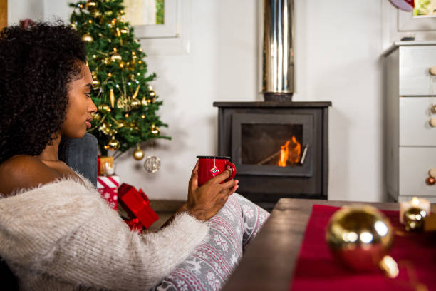 istock Black woman drinking hot beverage 1443640529