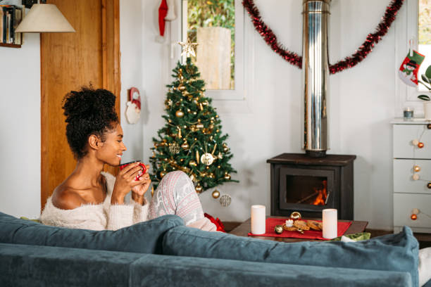 istock Black woman drinking hot beverage 1443640536