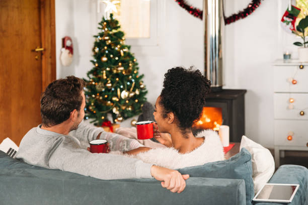 istock Diverse couple having cups of tea 1443640880