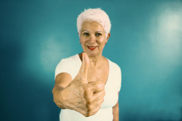 senior woman in purple dress, isolated, png