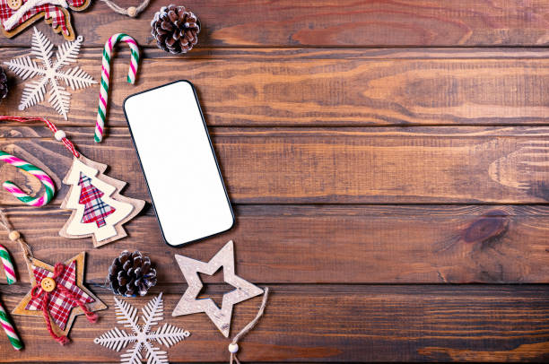 istock Smartphone mock up with rustic Christmas decorations 1443641307