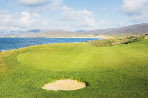Isle of Harris, UK - October 4 2021: Beautiful sunny day at the coastal links golf course Harris Golf Club at Scarista on the Isle of Lewis and Harris in the Outer Hebrides of Scotland, UK.