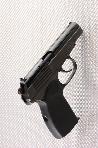 Odd perspective of a small 9mm handgun of the type used by eastern bloc police and military services.