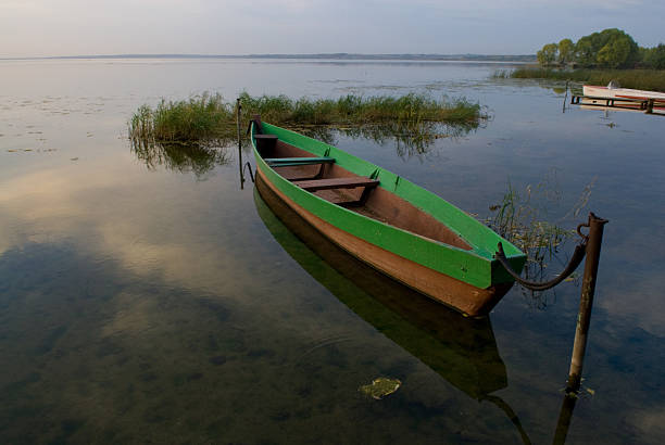 istock Boat and lake at twilight 144365028