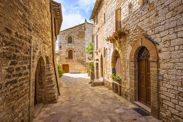 The Medieval religious christian town of Assisi in Umbria, Italy The Medieval religious christian town of Assisi in Umbria, Italy medieval architecture stock pictures, royalty-free photos & images