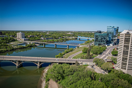 Aerial view of the Central Business District which is Saskatoons bustling neighbourhood of downtown living and business development. If you love the thriving energy of your neighbourhood streets lined with coffee shops, restaurants, shopping, gorgeous Meewasin, river, trails and nightlife then this community is for you.