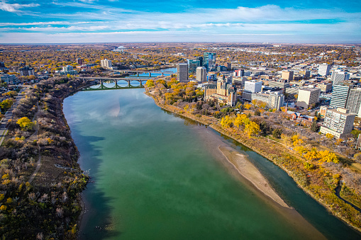 Aerial view of the Central Business District which is Saskatoons bustling neighbourhood of downtown living and business development. If you love the thriving energy of your neighbourhood streets lined with coffee shops, restaurants, shopping, gorgeous Meewasin, river, trails and nightlife then this community is for you.